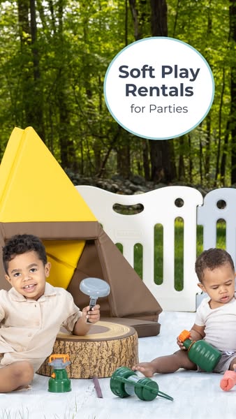The ad features two young children playing with a set of soft play equipment in a natural outdoor setting. The main mess