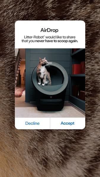 This ad uses the style of an Apple AirDrop notification to promote the Litter-Robot. The notification features an image 
