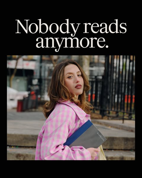 This ad features an image of a woman holding a book with the headline "Nobody reads anymore."