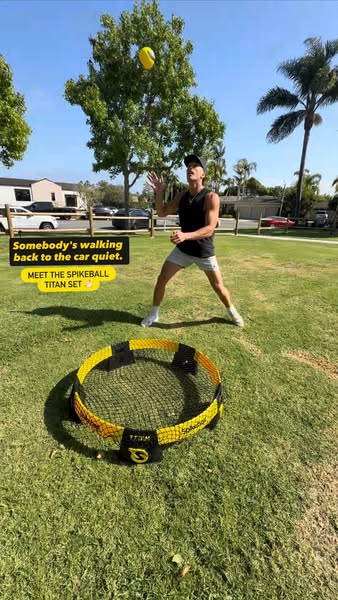 This image ad features Spikeball Titan. The brand is introduced by a player in the background juggling a ball. It introd