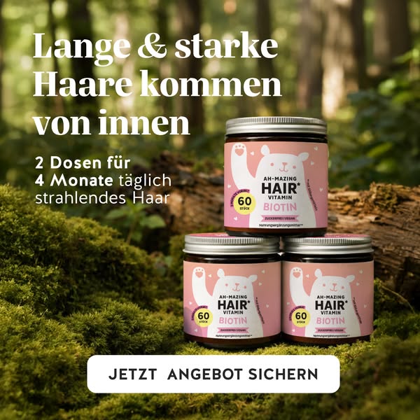 This image ad promotes a supplement called AH-Mazing Hair Vitamin Biotin, which claims to promote long and strong hair.