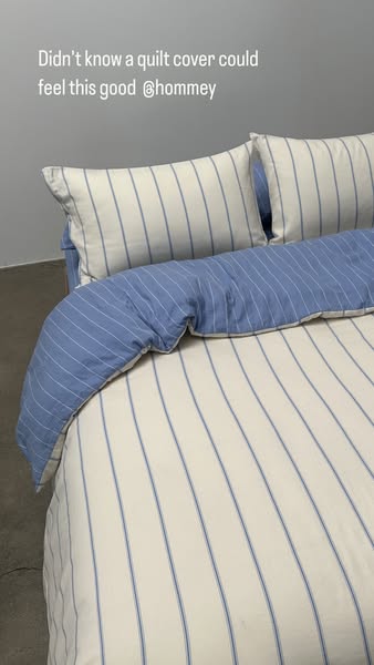 A simple image ad promoting a brand of quilt covers, featuring a testimonial about the feel of the product.