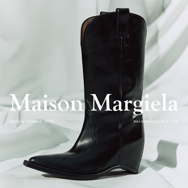 This image ad features a product shot of a leather Maison Margiela cowboy boot against a light background. The brand nam
