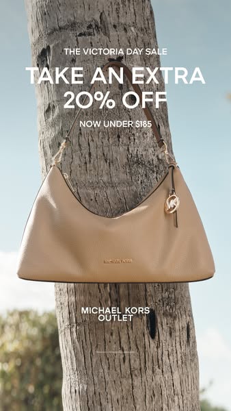 This image ad for Michael Kors Outlet advertises a Victoria Day sale with 20% off, featuring a shoulder bag for under $1