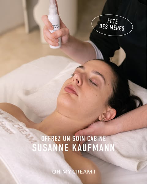 This ad features a woman receiving a facial. It promotes a Susanne Kaufmann product and encourages viewers to 'treat