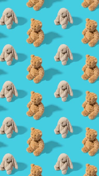 This ad features a pattern of stuffed animals on a blue background.
