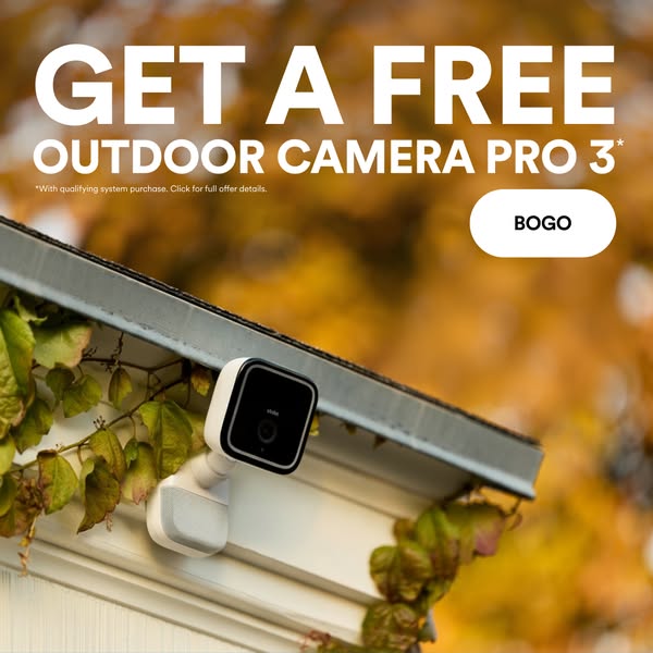 This ad promotes a BOGO deal for the Outdoor Camera Pro 3 security camera system. The camera is shown mounted on the sid