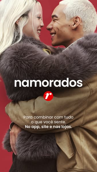 An image ad featuring a smiling man and woman, embraced and nose-to-nose, promoting the brand Renner. The ad highlights 