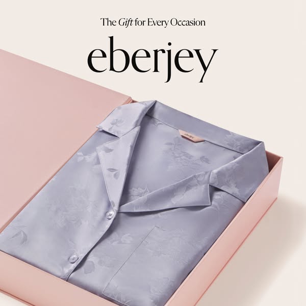 This ad features a light purple floral pajama set in a pink box. The ad emphasizes the sleepwear makes 'the gift for