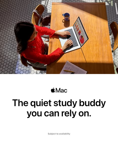 This ad showcases the Mac laptop as a 'quiet study buddy' in a warm, inviting setting. It uses a top-down shot o