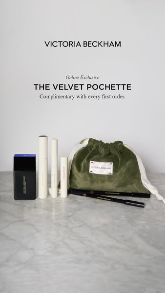 The ad showcases the Victoria Beckham brand by featuring a limited edition, online-exclusive velvet pochette offered as 