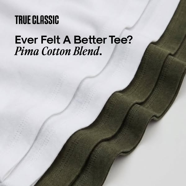 An image showcasing a close-up of folded, high-quality t-shirts emphasizing the superior feel of the Pima cotton blend a