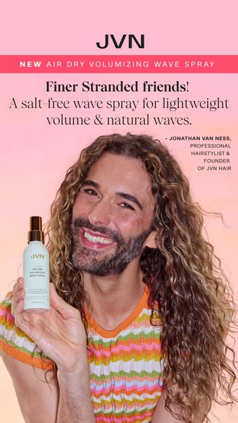 This image ad for JVN's Air Dry Volumizing Wave Spray features Jonathan Van Ness holding the product and promoting i