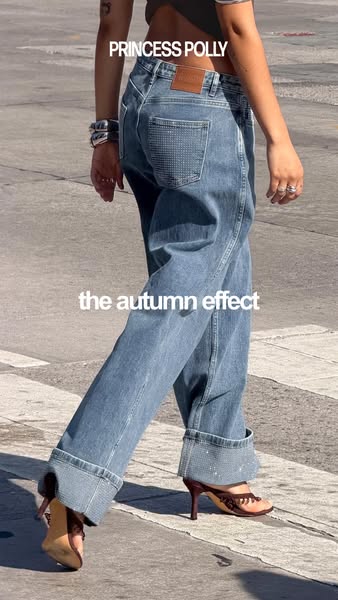 This ad for Princess Polly features a woman wearing a pair of Princess Polly jeans while walking on a crosswalk. The ad 