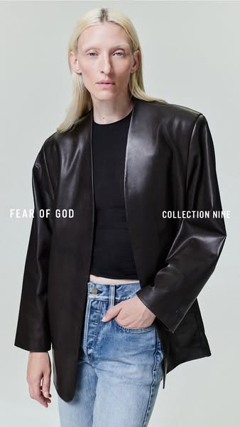 This ad features a minimalist product photo of a model wearing a leather blazer and jeans by Fear of God's Collectio