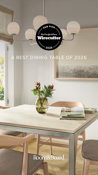 This image ad features the Room & Board dining table, which has been recognized as "A BEST DINING TABLE OF 2026