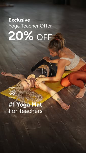 This image ad is for yoga teachers and features two yoga instructors, one providing an adjustment to the other. The ad p