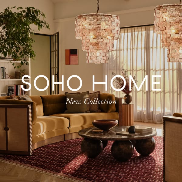 An image ad for Soho Home features a stylishly furnished living room with a focus on lighting and furniture. The ad is p