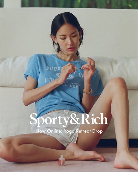 This ad showcases a woman sitting in athletic apparel, painting her nails. The ad promotes Sporty & Rich's Yoga