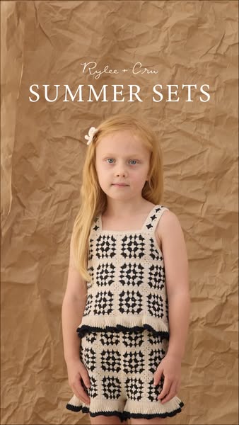 An image showcasing a young girl wearing a matching knit top and short set, promoting the brand Rylee + Cru's summer