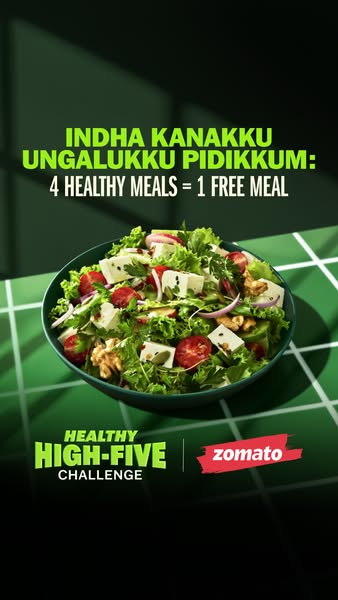 This image ad promotes a "Healthy High-Five Challenge" from Zomato, offering one free meal for every four heal