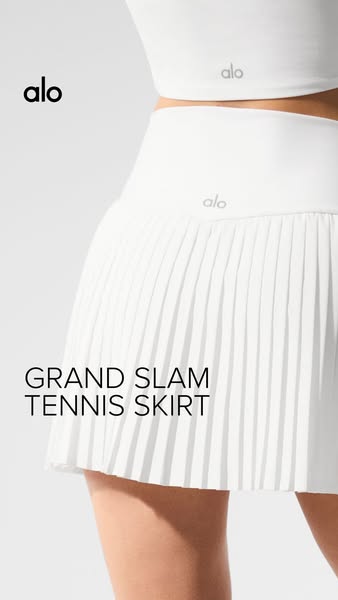 This ad showcases a white tennis skirt and coordinates with a matching athletic top.