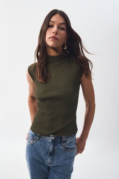 This ad features a woman wearing a ribbed, mock neck, sleeveless top and jeans. The ad is a simple product shot.