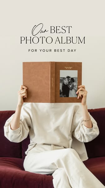 This image ad showcases a photo album, presumably designed for wedding photos, held by a person sitting on a couch. The 