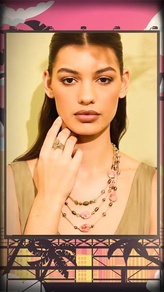 A close up studio shot ad for jewelry in an urban tropical setting.