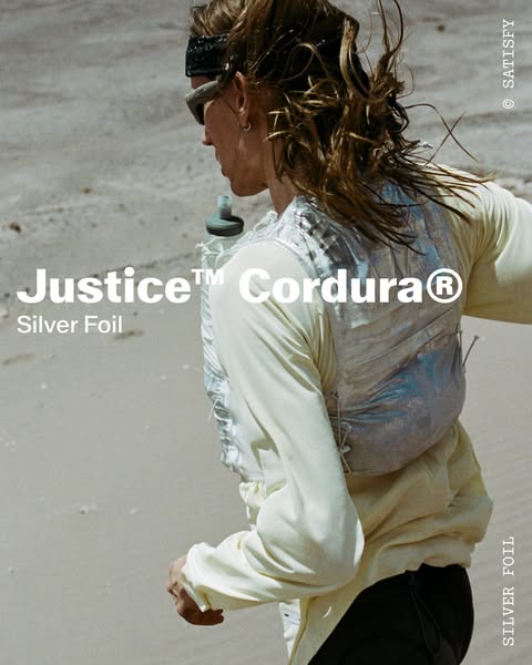 This ad features a person running along a sandy landscape wearing the featured Justice™ Cordura® Silver Foil pack. The p