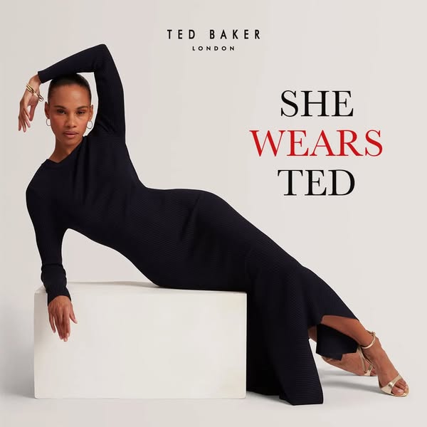 This Ted Baker image ad features a model wearing a black, long-sleeved, ribbed dress and gold sandals. The ad promotes t