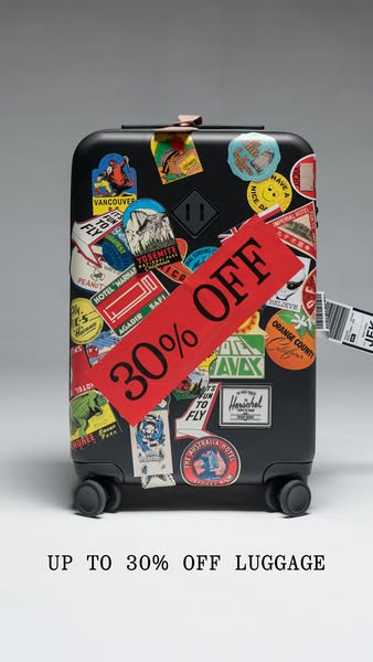 This image ad promotes Herschel luggage, offering "UP TO 30% OFF". The ad features a black Herschel suitcase a