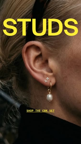 This ad showcases a set of earrings from Studs featuring a model wearing the earrings.