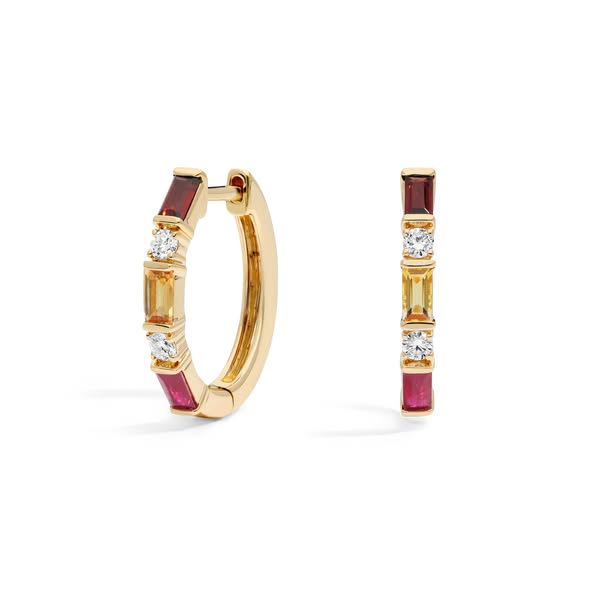This ad showcases a pair of gold hoop earrings with alternating gemstones and diamonds. The earrings are displayed again