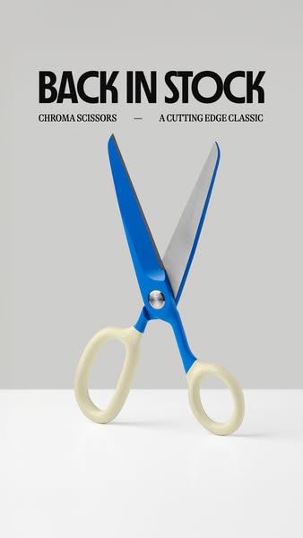 An image ad for Chroma Scissors. The scissors are blue and cream, standing upright on a white surface against a light gr