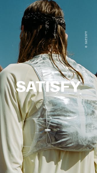 This ad showcases the running equipment brand Satisfy. The ad shows the back of a runner wearing a translucent running v