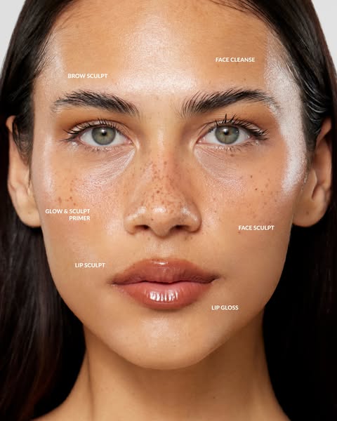 This image ad features a model with applied makeup, with the products that were used labeled on her face.