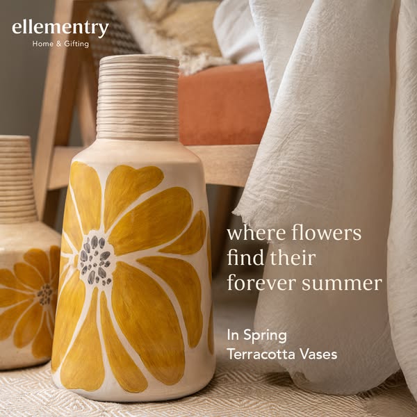 This image ad promotes Ellementry's terracotta vases as an ideal spring decor piece that brings a summery feel to an