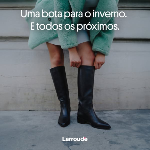 This image ad features the brand Larroude and presents the brand's black leather boots. The ad presents the boots as