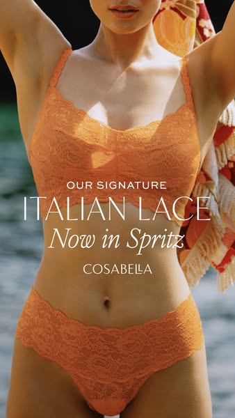 This image ad displays a model wearing an orange Cosabella lingerie set in front of a blurred background with water and 