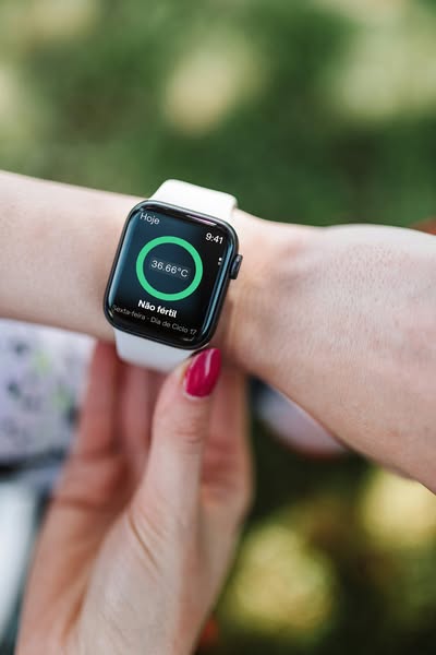 This ad showcases a fertility tracking app on an Apple Watch, targeting women interested in fertility monitoring.