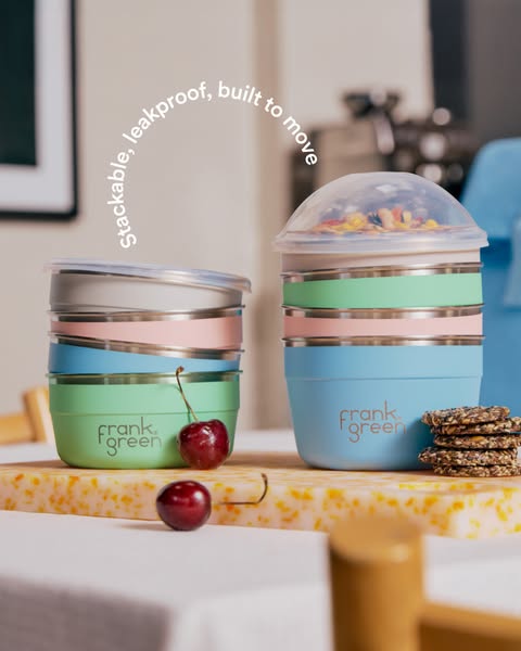 This image ad showcases Frank Green's stackable, leakproof food containers, emphasizing their portability and design