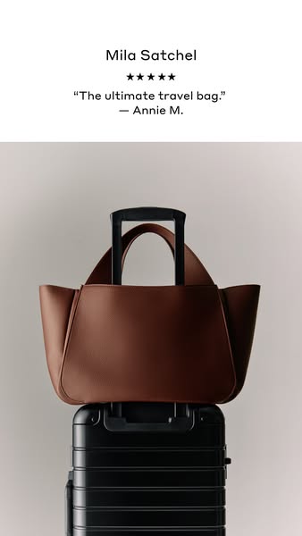 This ad features a satchel bag placed on top of a suitcase. The ad includes a five-star review of the bag.