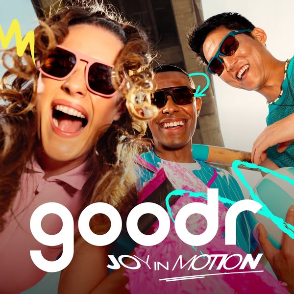 This image ad for Goodr sunglasses features 3 people smiling while wearing the sunglasses. The brand logo is shown in th
