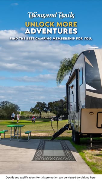 Ad for Thousand Trails camping membership. The ad uses a daytime campsite scene to promote outdoor adventures.