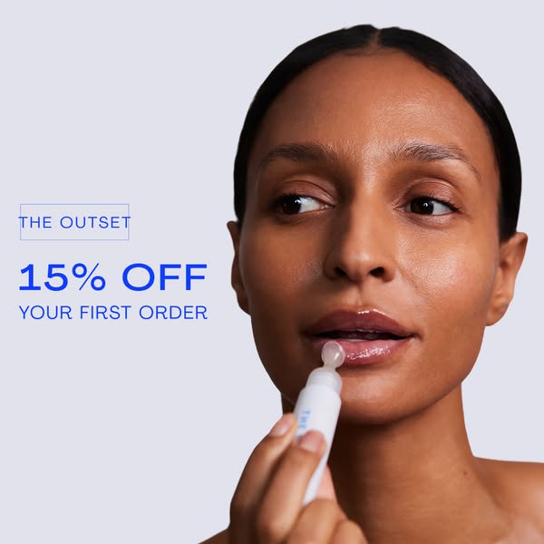 This ad for The Outset features a woman with clear skin applying the brand's lip treatment with a 15% off offer.