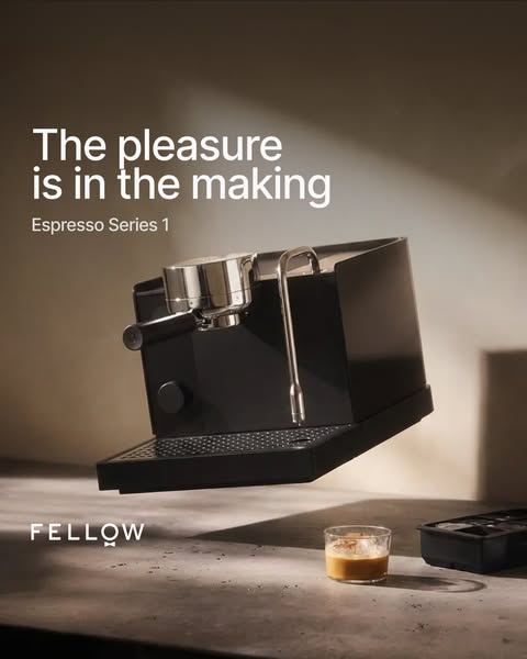 The ad features a sleek black Fellow Espresso Series 1 machine. The ad emphasizes the enjoyment derived from the process