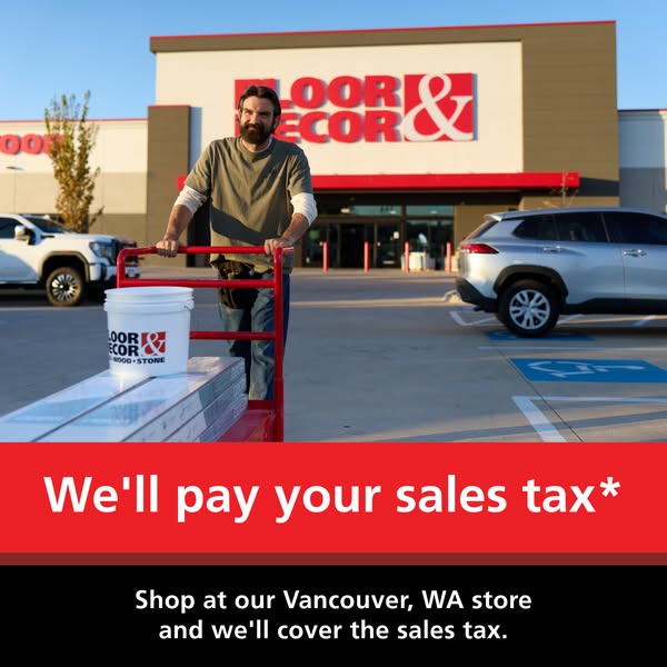 This ad promotes Floor & Decor's Vancouver, WA location. It features an image of a man pushing a cart filled wit