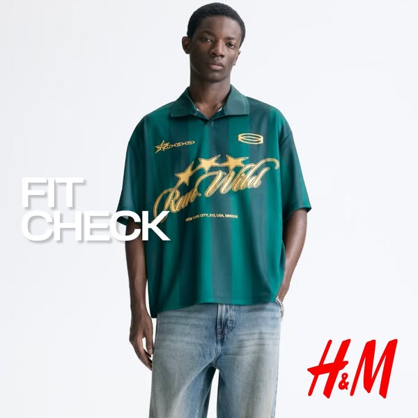 This ad is for H&M, featuring a man wearing a green and navy vertical striped shirt and light blue jeans. The image 