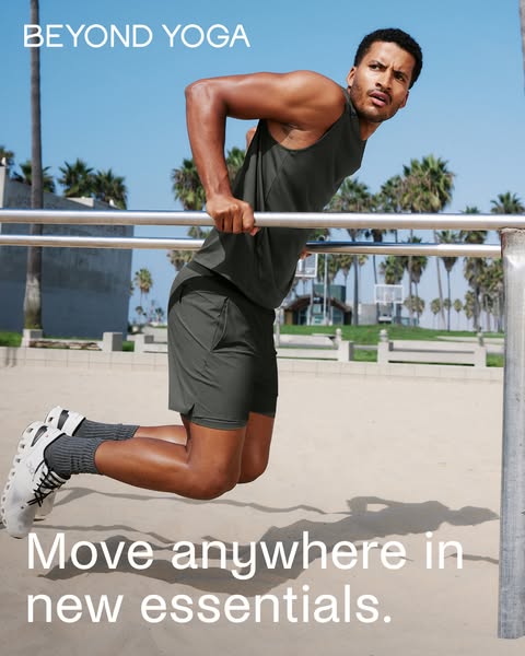This ad showcases a male athlete wearing Beyond Yoga apparel while exercising outdoors at a public workout area. The ad 